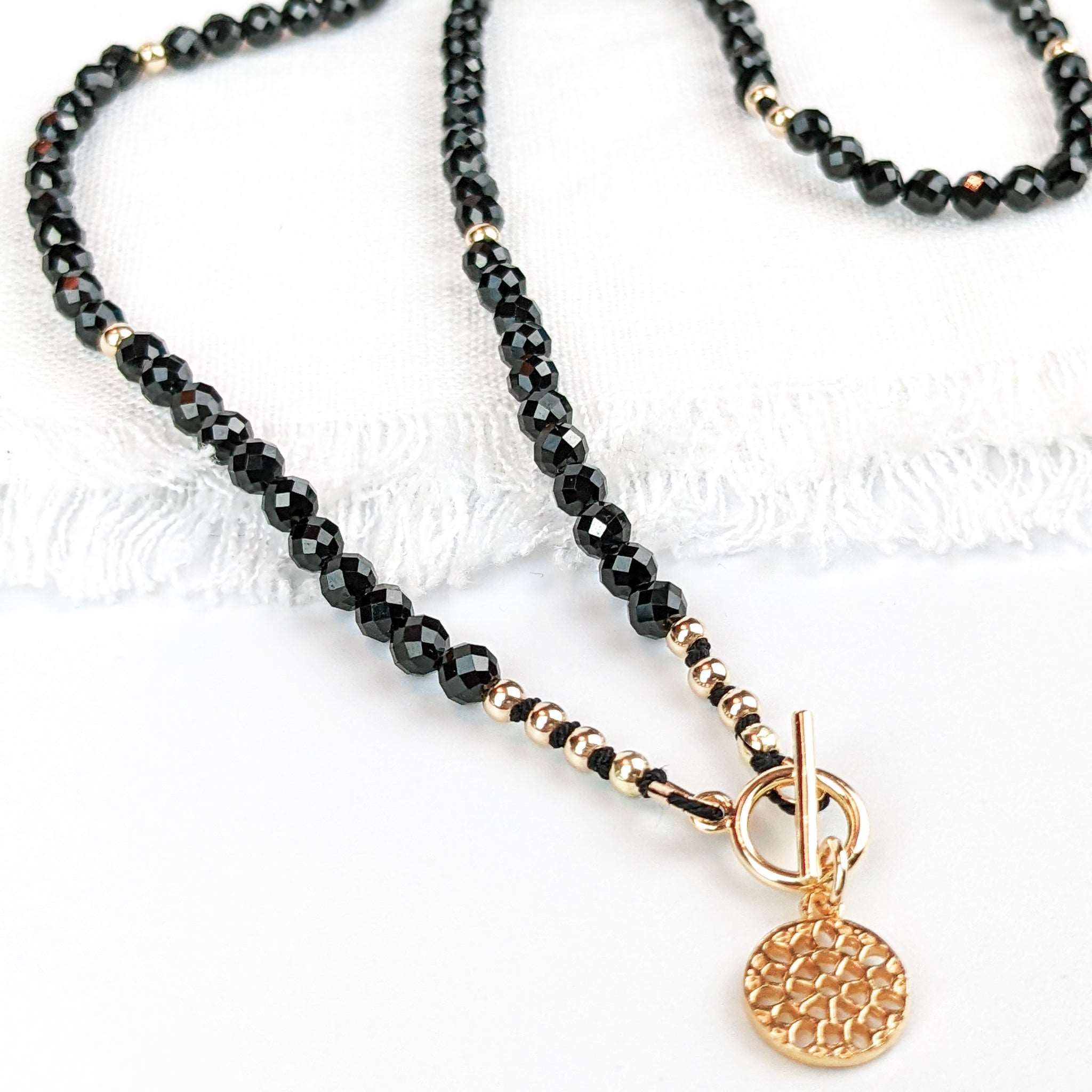Spiritual bead necklace on sale with black spinel